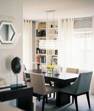 Dining room interior design - myLusciousLife.com - Books in the dining room via Lonny Mag.jpg